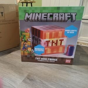 Minecraft mini fridge new in box! Also lights up comes w the cord awesome gift